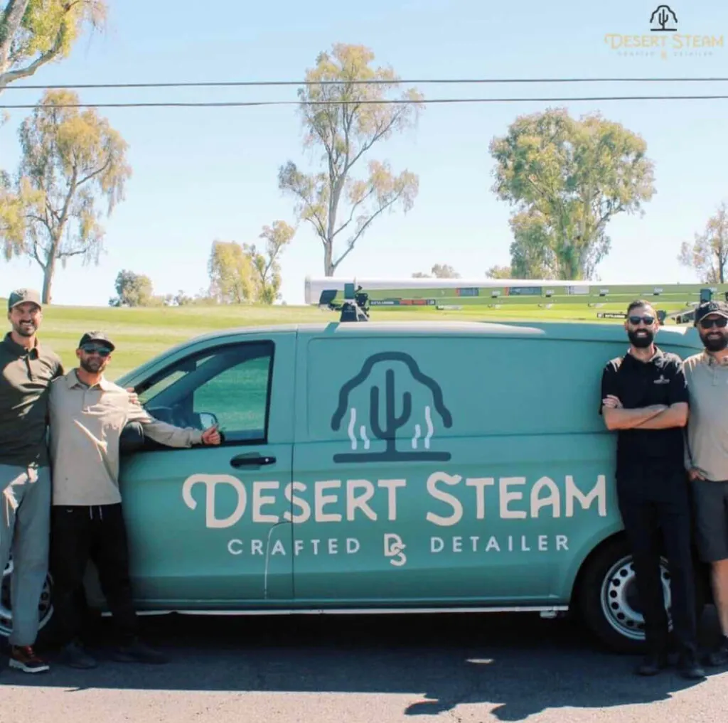 The Desert Steam Detail team beside their branded mobile detailing van in Scottsdale, Arizona